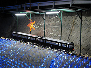 �f�n100�^�d�Ԃ̖͌^